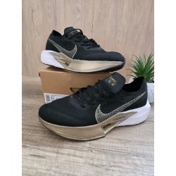 Zoom Vaporfly negra oro